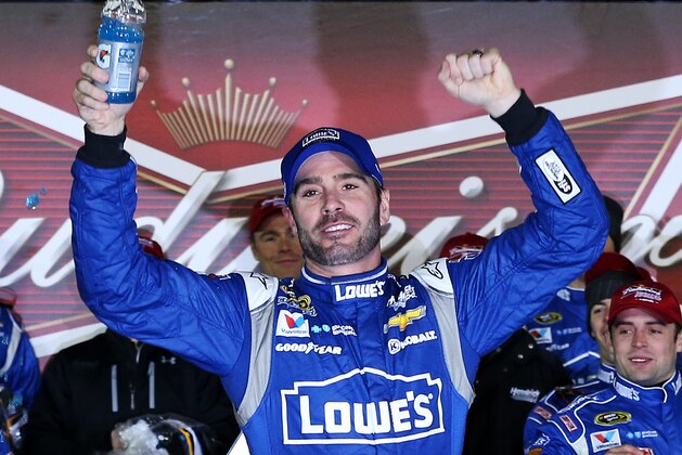 DAYTONA BEACH, FL - FEBRUARY 19:  Jimmie Johnson, driver of the #48 Lowe's Chevrolet, celebrates in victory lane after winning the NASCAR Sprint Cup Series Budweiser Duel 2 at Daytona International Speedway on February 19, 2015 in Daytona Beach, Florida.  (Photo by Patrick Smith/Getty Images)