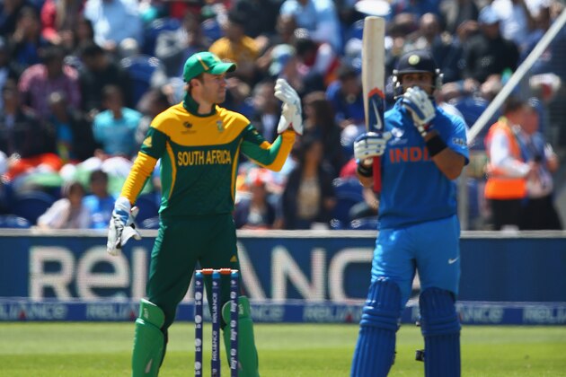 CARDIFF, WALES - JUNE 06:  The  spidercam hovers above Virat Kohli (R) of India and wicketkeeper AB de Villiers of South Africa during the Group B ICC Champions Trophy match between India and South Africa at the SWALEC Stadium on June 6, 2013 in Cardiff, Wales.  (Photo by Michael Steele/Getty Images)