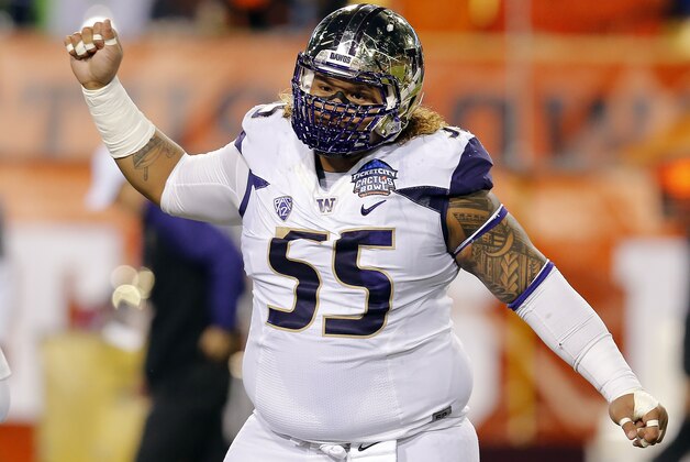 Washington defensive lineman Danny Shelton (55) in the first half during the Cactus Bowl NCAA college football game against Oklahoma State, Friday, Jan. 2, 2015, in Tempe, Ariz. (AP Photo/Rick Scuteri)