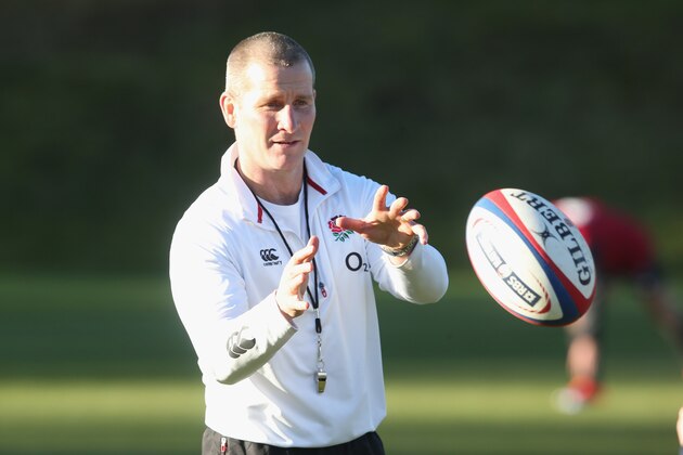 BAGSHOT, ENGLAND - FEBRUARY 17:  Stuart Lancaster, the England head coach, catches the ball during the England training session held at Pennyhill Park on February 17, 2015 in Bagshot, England.  (Photo by David Rogers/Getty Images)
