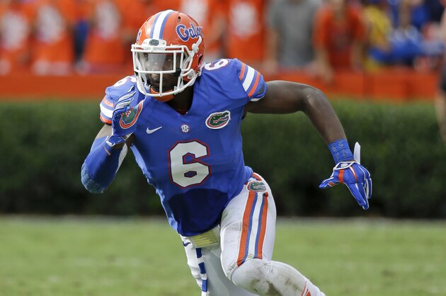 Florida defensive lineman Dante Fowler, Jr. (6) runs during a play against Eastern Michigan in the first half of an NCAA college football game in Gainesville, Fla., Saturday, Sept. 6, 2014. (AP Photo/John Raoux)