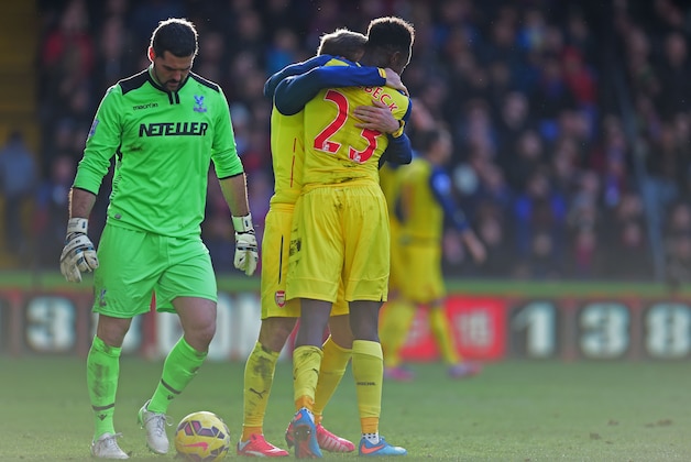LONDON, ENGLAND - FEBRUARY 21:  Despair for Julian Speroni of Crystal Palace as Danny Welbeck of Arsenal (23) celebrates as Olivier Giroud scores their second goal during the Barclays Premier League match between Crystal Palace and Arsenal at Selhurst Park on February 21, 2015 in London, England.  (Photo by Jamie McDonald/Getty Images)