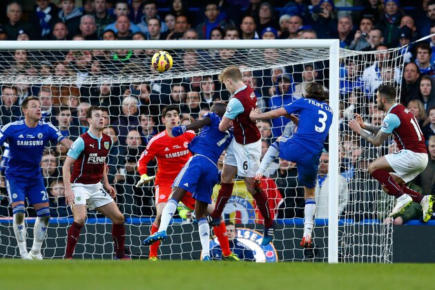 LONDON, ENGLAND - FEBRUARY 21:  Ben Mee #6 of Burnley scores the equalising goal with a header during the Barclays Premier League match between Chelsea and Burnley at Stamford Bridge on February 21, 2015 in London, England.  (Photo by Julian Finney/Getty Images)