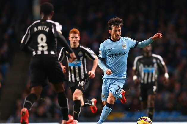 MANCHESTER, ENGLAND - FEBRUARY 21:  David Silva of Manchester City on the ball during the Barclays Premier League match between Manchester City and Newcastle United at Etihad Stadium on February 21, 2015 in Manchester, England.  (Photo by Clive Brunskill/Getty Images)
