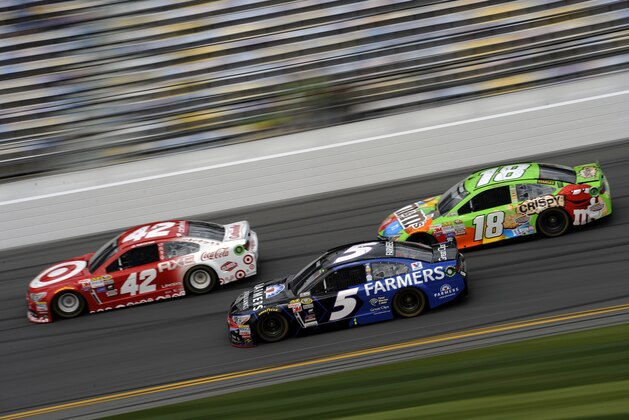 DAYTONA BEACH, FL - FEBRUARY 21:  Kyle Larson, driver of the #42 Target Chevrolet, leads Kasey Kahne, driver of the #5 Farmers Insurance Chevrolet, and Kyle Busch, driver of the #18 M&M's Crispy Toyota, during practice for the NASCAR Sprint Cup Series 57th Annual Daytona 500 at Daytona International Speedway on February 21, 2015 in Daytona Beach, Florida.  (Photo by Jared C. Tilton/Getty Images)