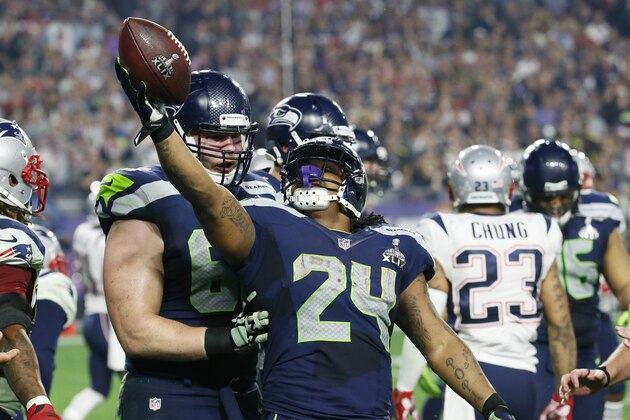 Seattle Seahawks running back Marshawn Lynch (24) celebrates a first down run during the second half of NFL Super Bowl XLIX football game against the New England Patriots Sunday, Feb. 1, 2015, in Glendale, Ariz. (AP Photo/Matt York)
