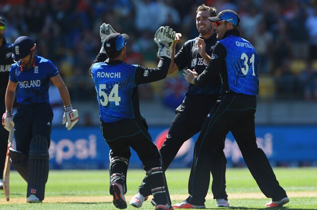WELLINGTON, NEW ZEALAND - FEBRUARY 20:  Tim Southee of New Zealand celebrates with team-mates after taking the wicket of James Taylor of England during the 2015 ICC Cricket World Cup match between England and New Zealand at Wellington Regional Stadium on February 20, 2015 in Wellington, New Zealand.  (Photo by Shaun Botterill/Getty Images)