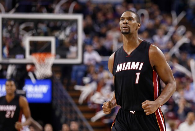 Jan 16, 2015; Sacramento, CA, USA; Miami Heat center Chris Bosh (1) as a timeout is called after making a basket against the Sacramento Kings during the third quarter at Sleep Train Arena. The Miami Heat defeated the Sacramento Kings 95-83. Mandatory Credit: Kelley L Cox-USA TODAY Sports