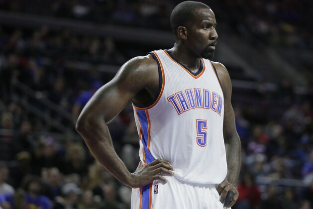 Oklahoma City Thunder's Kendrick Perkins stands on the court after being whistled for a foul during the second half of an NBA basketball game against the Detroit Pistons Sunday, Dec. 7, 2014, in Detroit. The Thunder defeated the Pistons 96-94. (AP Photo/Duane Burleson)