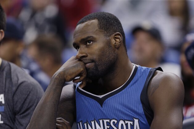 Minnesota Timberwolves forward Shabazz Muhammad (15) reacts from the bench in the second half of an NBA basketball game  against the New Orleans Pelicansin New Orleans, Friday, Nov. 14, 2014. The Pelicans won 139-91. (AP Photo/Gerald Herbert)