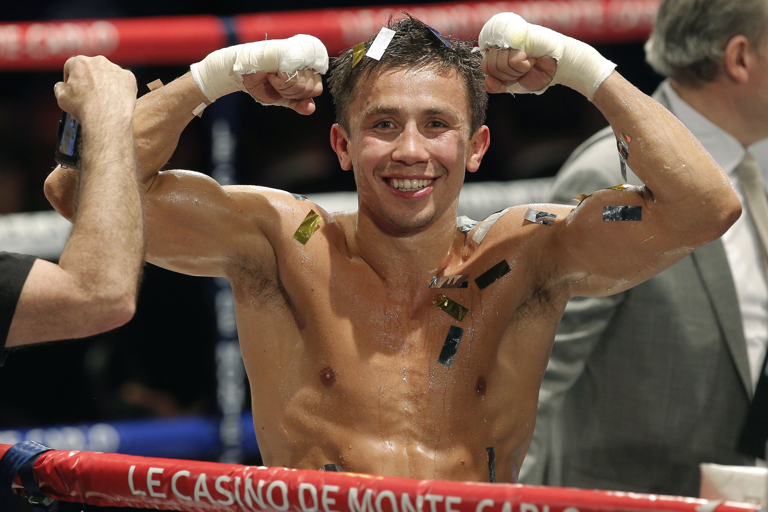 FILE - In this March 30, 2013, file photo, Gennady Golovkin, of Kazakhstan, reacts after defeating Nobuhiro Ishida, of Japan, in their WBA middleweight title fight in Monaco. After 18 consecutive knockout victories, the WBA middleweight champion says he hopes to fight four more times in 2015 while pursuing big-money bouts with Miguel Cotto, Canelo Alvarez and other big-name champions. (AP Photo/Lionel Cironneau, File)