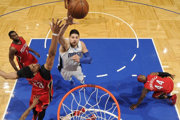 ORLANDO, FL - FEBRUARY 20: Nikola Vucevic #9 of the Orlando Magic shoots against the New Orleans Pelicans on February 20, 2015 at Amway Center in Orlando, Florida. NOTE TO USER: User expressly acknowledges and agrees that, by downloading and or using this photograph, User is consenting to the terms and conditions of the Getty Images License Agreement. Mandatory Copyright Notice: Copyright 2015 NBAE (Photo by Fernando Medina/NBAE via Getty Images)