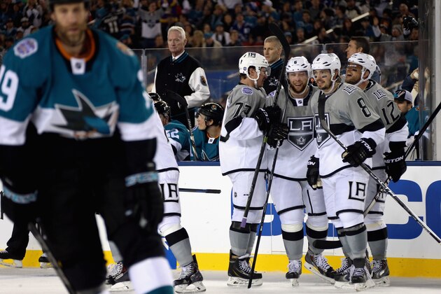 SANTA CLARA, CA - FEBRUARY 21:  Marian Gaborik #12 of the Los Angeles Kings celebrates his goal with teammates Jeff Carter #77, Drew Doughty #8 and Jake Muzzin #6 during the second period of the 2015 Coors Light NHL Stadium Series game against the San Jose Sharks at Levi's Stadium on February 21, 2015 in Santa Clara, California.  (Photo by Dave Sandford/NHLI via Getty Images)