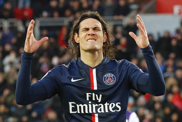 PSG's Uruguayan Edinson Cavani reacts after missing a chance against Toulouse FC during his French League one soccer match at the Parc des Princes stadium, in Paris, France, Saturday, Feb. 21, 2015. (AP Photo/Jacques Brinon)