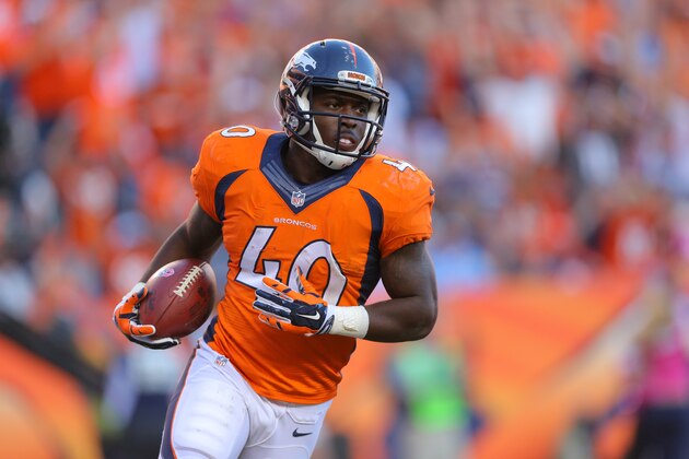 DENVER, CO - OCTOBER 5:  Running back Juwan Thompson #40 of the Denver Broncos turns after running for a fourth-quarter eight-yard rushing touchdown, his first career touchdown, against the Arizona Cardinals during a game at Sports Authority Field at Mile High on October 5, 2014 in Denver, Colorado.  (Photo by Justin Edmonds/Getty Images)