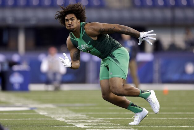 USC defensive lineman Leonard Williams runs a drill at the NFL football scouting combine in Indianapolis, Sunday, Feb. 22, 2015. (AP Photo/David J. Phillip)