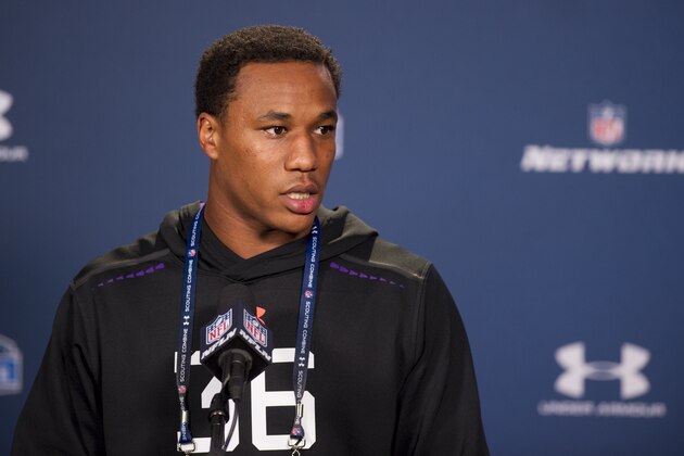 Washington defensive back Marcus Peters talks with reporters during a news conference at the NFL football scouting combine at Lucas Oil Stadium in Indianapolis, Saturday, Feb. 21, 2015. (AP Photo/Doug McSchooler)