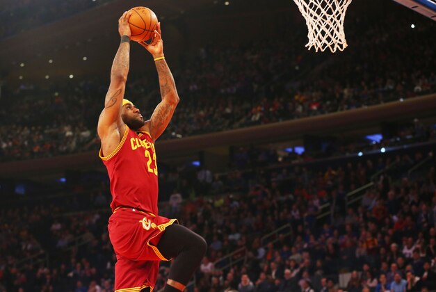 Feb 22, 2015; New York, NY, USA;  Cleveland Cavaliers forward LeBron James (23) goes up to dunk during the first quarter against the New York Knicks at Madison Square Garden. Mandatory Credit: Anthony Gruppuso-USA TODAY Sports