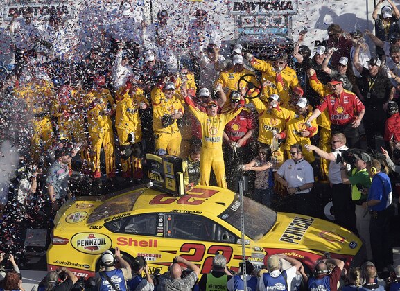 Joey Logano celebrates in Victory Lane after winning the Daytona 500 NASCAR Sprint Cup series auto race at Daytona International Speedway, Sunday, Feb. 22, 2015, in Daytona Beach, Fla. (AP Photo/Phelan M. Ebenhack)