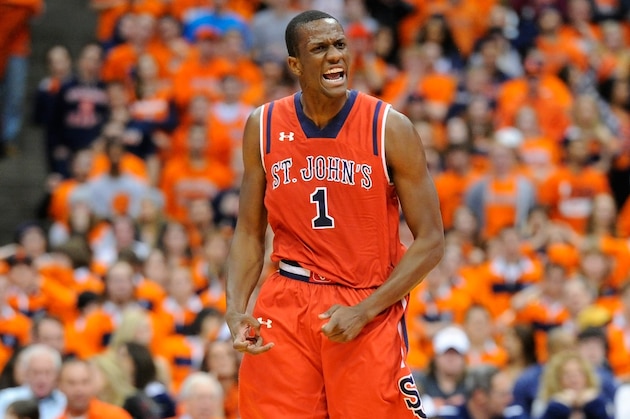 SYRACUSE, NY - DECEMBER 06:  Phil Greene IV #1 of the St. John's Red Storm reacts to a three point basket against the Syracuse Orange during the second half of the game at the Carrier Dome on December 6, 2014 in Syracuse, New York.  St. John's defeated Syracuse 69-57.  (Photo by Rich Barnes/Getty Images)