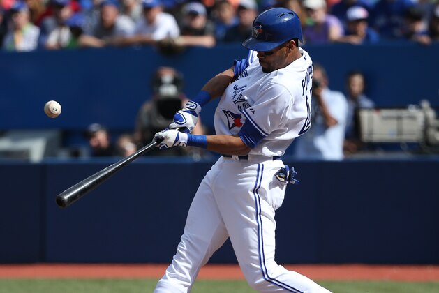 TORONTO, CANADA - SEPTEMBER 28: Dalton Pompey #45 of the Toronto Blue Jays hits a single in the second inning during MLB game action against the Baltimore Orioles on September 28, 2014 at Rogers Centre in Toronto, Ontario, Canada. (Photo by Tom Szczerbowski/Getty Images)