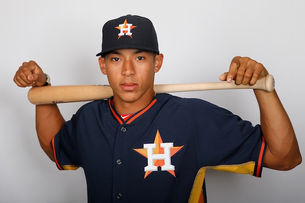 KISSIMMEE, FL - FEBRUARY 21:  Carlos Correa #84 of the Houston Astros poses for a portrait during photo day on February 21, 2014 at Osceola County Stadium in Kissimmee, Florida.  (Photo by Kevin C. Cox/Getty Images)