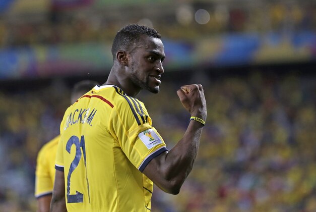 Colombia's Jackson Martinez celebrates after scoring his teams third goal during the group C World Cup soccer match between Japan and Colombia at the Arena Pantanal in Cuiaba, Brazil, Tuesday, June 24, 2014. (AP Photo/Felipe Dana)