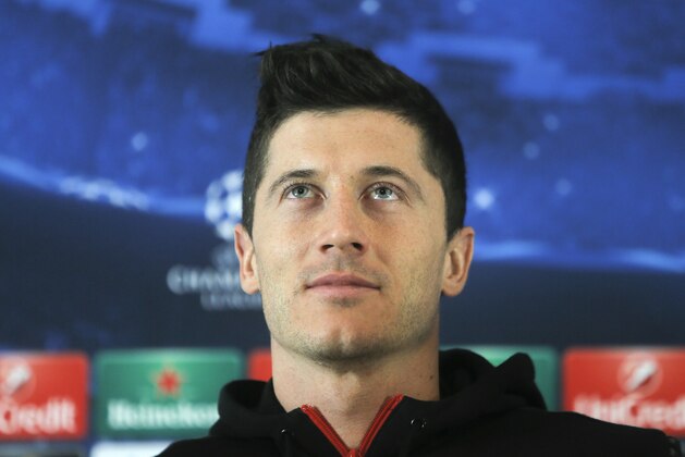 FC Bayern's forward, Robert Lewandowski, of Poland attends a press conference in Lviv, western Ukraine, Monday, Feb. 16, 2015. FC Bayern Munich will play against FC Shakhtar Donetsk in a Champions League, Round of 16, first leg match on Tuesday in Lviv. (AP Photo/Efrem Lukatsky)