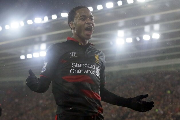 Liverpool’s Raheem Sterling celebrates after scoring a goal during the English Premier League soccer match between Southampton and Liverpool at St Mary's Stadium, Southampton, England, Sunday, Feb. 22, 2015. (AP Photo/Tim Ireland)