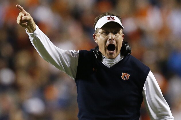Auburn coach Gus Malzahn yells to an official during the second half of an NCAA college football game against South Carolina on Saturday, Oct. 25, 2014, in Auburn, Ala. Auburn won 42-35. (AP Photo/Brynn Anderson)