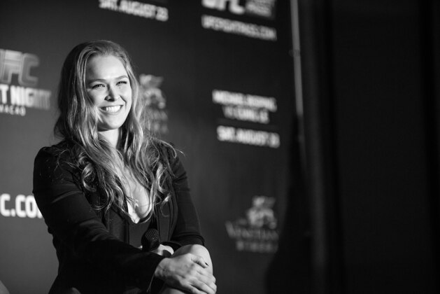 HONG KONG - AUGUST 20:  EDITORS NOTE: Image has been converted to black and white.) UFC womens bantamweight champion Ronda Rousey at a Q&A session during the Macao UFC Fight Night Press Conference at the Four Season Hotel on August 20, 2014 in Hong Kong.  (Photo by Anthony Kwan/Getty Images)