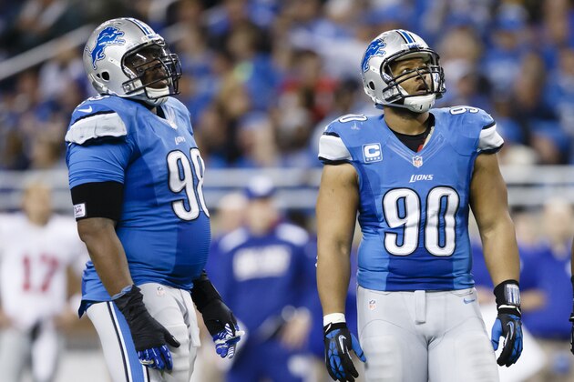 Detroit Lions defensive tackle Nick Fairley (98), defensive tackle Ndamukong Suh (90) and defensive end Willie Young (79) against the New York Giants during an NFL football game at Ford Field in Detroit, Sunday, Dec. 22, 2013. (AP Photo/Rick Osentoski)