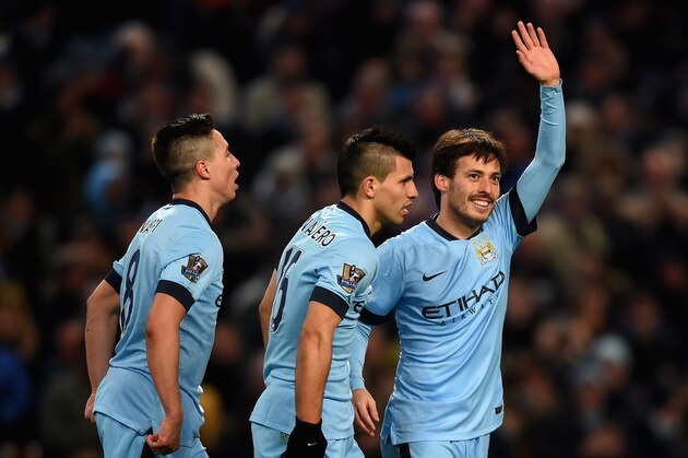 MANCHESTER, ENGLAND - FEBRUARY 21: David Silva of Manchester City celebrates scoring their fourth goal during the Barclays Premier League match between Manchester City and Newcastle United at Etihad Stadium on February 21, 2015 in Manchester, England.  (Photo by Michael Regan/Getty Images)