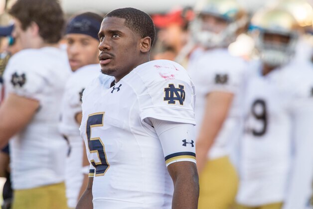 Nov 29, 2014; Los Angeles, CA, USA; Notre Dame Fighting Irish quarterback Everett Golson (5) watches from the bench in the fourth quarter against the USC Trojans at the Los Angeles Memorial Coliseum. USC won 49-14. Mandatory Credit: Matt Cashore-USA TODAY Sports