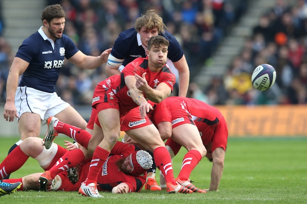 EDINBURGH, SCOTLAND - FEBRUARY 15:  Rhys Webb of Wales passes the ball during the RBS Six Nations match between Scotland and Wales at Murrayfield Stadium on February 15, 2015 in Edinburgh, Scotland.  (Photo by David Rogers/Getty Images)