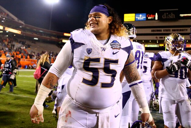 Jan 2, 2015; Tempe, AZ, USA; Washington Huskies defensive lineman Danny Shelton (55) following the game against the Oklahoma State Cowboys in the 2015 Cactus Bowl at Sun Devil Stadium. Oklahoma State defeated Washington 30-22. Mandatory Credit: Mark J. Rebilas-USA TODAY Sports
