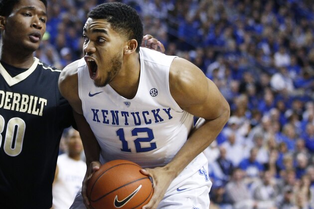LEXINGTON, KY - JANUARY 20: Karl-Anthony Towns #12 of the Kentucky Wildcats goes to the basket against Damian Jones #30 of the Vanderbilt Commodores in the first half of the game at Rupp Arena on January 20, 2015 in Lexington, Kentucky. (Photo by Joe Robbins/Getty Images)