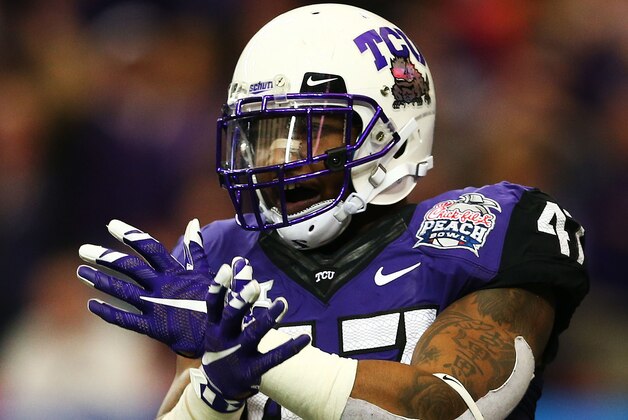 ATLANTA, GA - DECEMBER 31:  Paul Dawson #47 of the TCU Horned Frogs reacts in the second quarter against the Ole Miss Rebels during the Chik-fil-A Peach Bowl at Georgia Dome on December 31, 2014 in Atlanta, Georgia.  (Photo by Streeter Lecka/Getty Images)