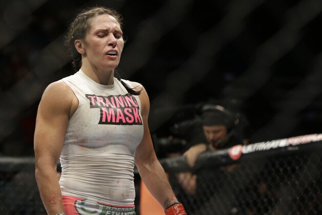 Cat Zingano after her fight against Amanda Nunes, Saturday, Sept. 27, 2014, in Las Vegas. Zingano won via TKO. (AP Photo/John Locher)