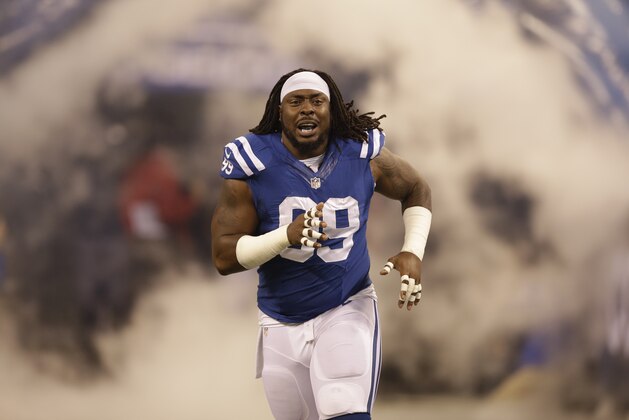 Indianapolis Colts defensive end Ricky Jean Francois takes the field before an NFL football game Sunday, Nov. 30, 2014, in Indianapolis. (AP Photo/Darron Cummings)