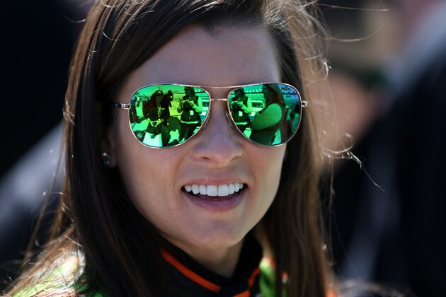 DAYTONA BEACH, FL - FEBRUARY 15:  Danica Patrick, driver of the #10 GoDaddy Chevrolet, stands on the grid during qualifying for the 57th Annual Daytona 500 at Daytona International Speedway on February 15, 2015 in Daytona Beach, Florida.  (Photo by Sarah Glenn/Getty Images)