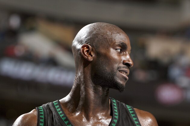 DALLAS - NOVEMBER 27:  Kevin Garnett #21 of the Minnesota Timberwolves smiles during the NBA game against the Dallas Mavericks on November 27, 2006 at the American Airlines Center in Dallas, Texas. The Mavs won 93-87. NOTE TO USER: User expressly acknowledges and agrees that, by downloading and/or using this Photograph, user is consenting to the terms and conditions of the Getty Images License Agreement. Mandatory Copyright Notice: Copyright 2006 NBAE (Photo by Glenn James/NBAE via Getty Images)