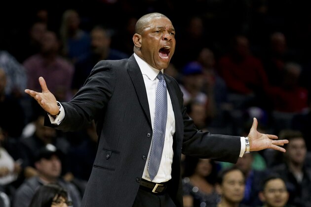 Los Angeles Clippers head coach Doc Rivers yells to his team during the first half of an NBA basketball game against the Sacramento Kings in Los Angeles, Saturday, Feb. 21, 2015. (AP Photo/Chris Carlson)
