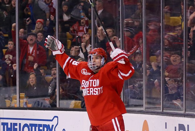 BOSTON, MA - FEBRUARY 23: Robbie Baillargeon #19 of the Boston University Terriers celebrates after scoring a goal against the Northeastern Huskies during the second period of the 2015 Beanpot Tournament Championship game at TD Garden on February 23, 2015 in Boston, Massachusetts.  (Photo by Maddie Meyer/Getty Images)