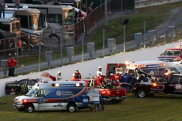 DAYTONA BEACH, FL - FEBRUARY 21:  The car of Kyle Busch, driver of the #54 Monster energy Toyota, is seen against a wall after crashing during the NASCAR XFINITY Series Alert Today Florida 300 at Daytona International Speedway on February 21, 2015 in Daytona Beach, Florida. Busch was transported to a local hospital with a lower body injury and will not race in the NASCAR Sprint Cup Series Daytona 500 tomorrow.  (Photo by Brian Lawdermilk/Getty Images)