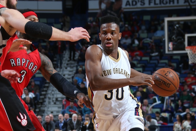 NEW ORLEANS, LA - FEBRUARY 23: Norris Cole #30 of the New Orleans Pelicans drives to the basket against the Toronto Raptors during the game on February 23, 2015 at Smoothie King Center in New Orleans, Louisiana. NOTE TO USER: User expressly acknowledges and agrees that, by downloading and/or using this photograph, User is consenting to the terms and conditions of the Getty Images License Agreement. Mandatory Copyright Notice: Copyright 2015 NBAE (Photo by Layne Murdoch Jr./NBAE via Getty Images)