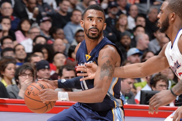 LOS ANGELES, CA - FEBRUARY 23: Mike Conley #11 of the Memphis Grizzlies looks to move the ball against the Los Angeles Clippers during the game on February 23, 2015 at STAPLES Center in Los Angeles, California. NOTE TO USER: User expressly acknowledges and agrees that, by downloading and/or using this photograph, User is consenting to the terms and conditions of the Getty Images License Agreement. Mandatory Copyright Notice: Copyright 2015 NBAE (Photo byAndrew Bernstein./NBAE via Getty Images)