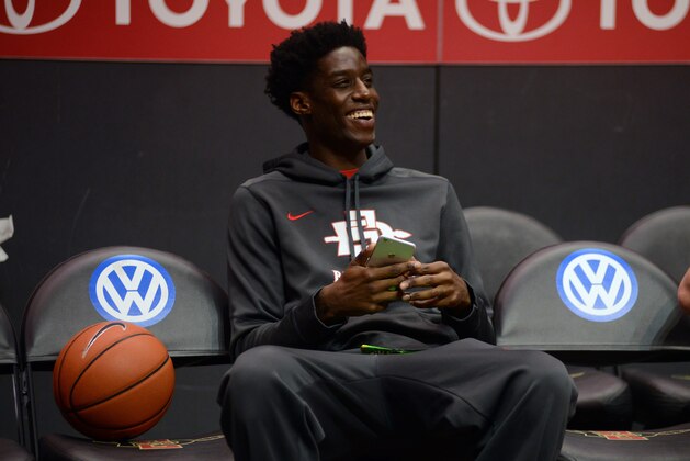 SAN DIEGO, CA - JANUARY 06:  Dwayne Polee #5 of the San Diego State Aztecs sits on the bench unable to play because of medical reasons prior to the first half of the game against the New Mexico Lobos at Viejas Arena on January 6, 2015 in San Diego, California. (Photo by Kent C. Horner/Getty Images)