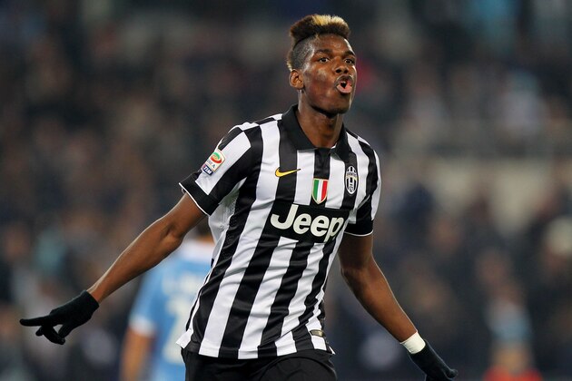 ROME, ITALY - NOVEMBER 22:  Paul Pogba of Juventus FC celebrates after scoring the opening goal during the Serie A match between SS Lazio and Juventus FC at Stadio Olimpico on November 22, 2014 in Rome, Italy.  (Photo by Paolo Bruno/Getty Images)