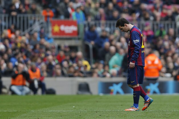 Barcelona's Lionel Messi, from Argentina, reacts during a Spanish La Liga soccer match against Malaga at the Camp Nou stadium in Barcelona, Spain, Saturday, Feb. 21, 2015. (AP Photo/Emilio Morenatti)